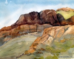 Plein air painting of mountain with green patches